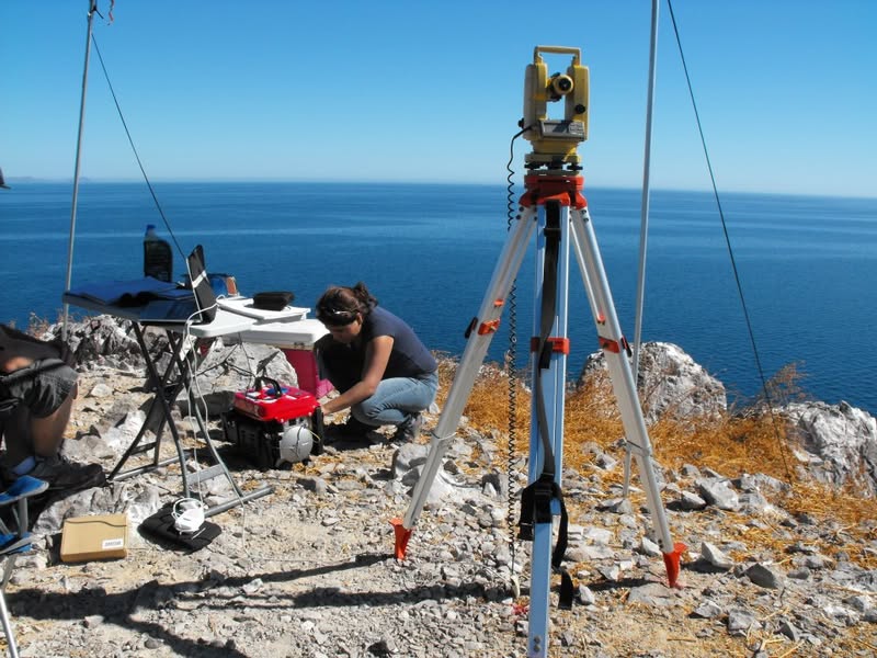 Observation station with theodolite and ocean view